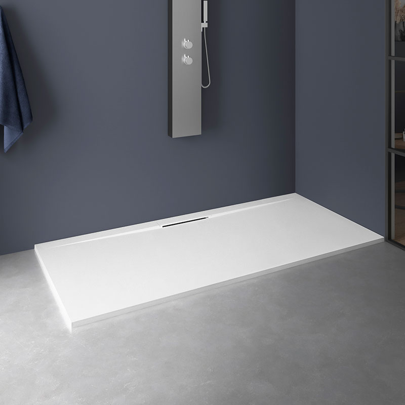 Kineline shower tray with waste on long side